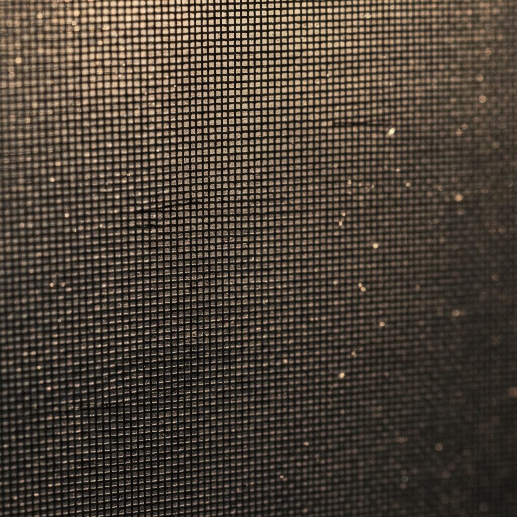 Le tissu screen filtre la chaleur solaire tout en conservant la vue sur l'extérieur.